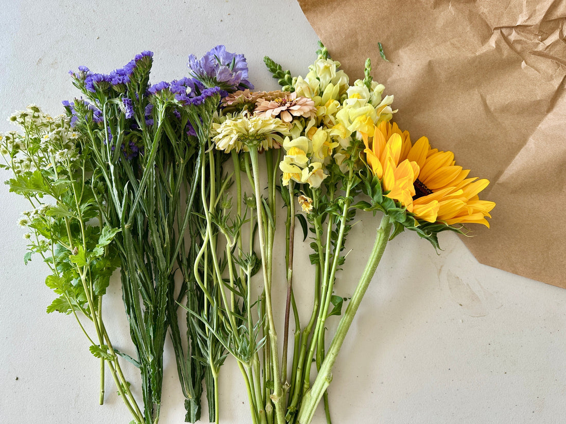 Arranging a handtied bouquet into an arrangement